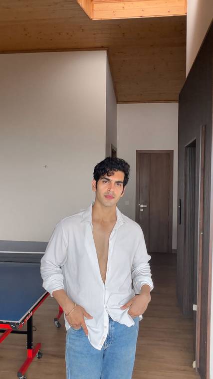 Aviral in a white shirt